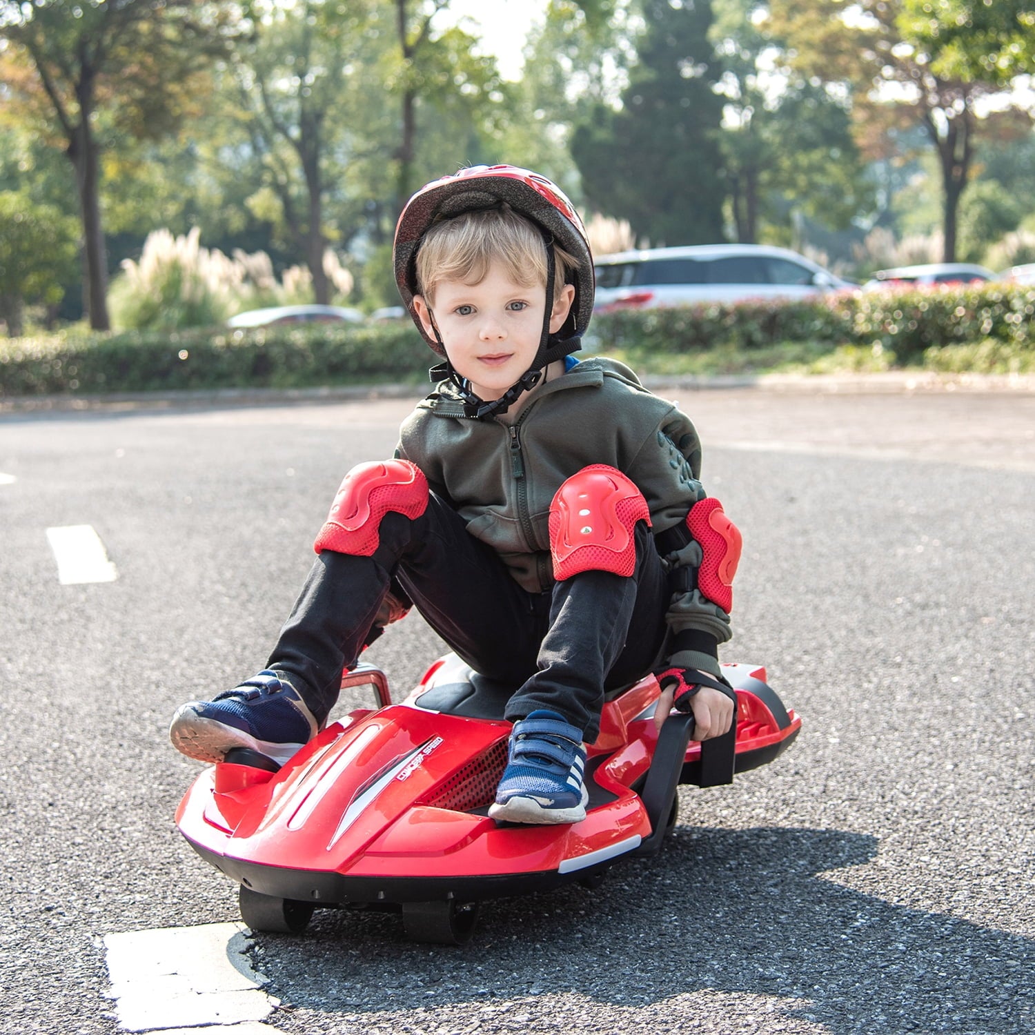 Track 7 24 V Ride on Car with Helmet, Knee Pads, Gloves, Devilfish Pattern Ride on Electric Scooter with Spray Function, Gravity Steering, Music, Hnadrails, Max Speed 6.84 mph, Red